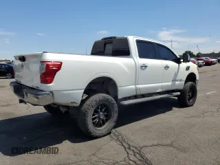 2016 Nissan Titan Platinum Reserve z VIN 1N6BA1F41GN504539, wystawiony jako Copart lot #64812975 z przebiegiem 143 144 mil mil oraz Szkoda całkowita • Salvage title. Historia ofert i sprzedaży dostępna na DreamBid. Obrazek 3.