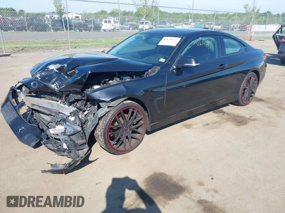 2015 BMW 4 Series 428i xDrive with VIN WBA3N9C59FK248249, listed as a IAAI auction lot 42140141 with 106,916 mi miles and . Bid and sale history available at DreamBid. Image 2.
