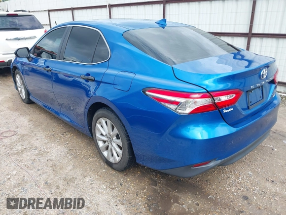 2019 Toyota Camry LE with VIN 4T1B11HK7KU259920, listed as a IAAI auction lot 42115493 with 69,254 mi miles and . Bid and sale history available at DreamBid. Image 3.
