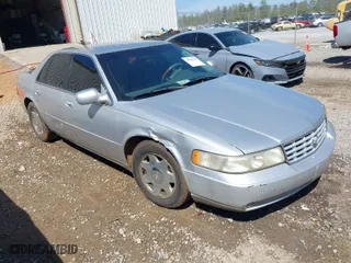 1999 Cadillac Seville Luxury SLS with VIN 1G6KS54Y2XU925322, listed as a IAAI auction lot 41889695 with 150,587 mi miles. Bid and sale history available at carsss.com. Image 1.