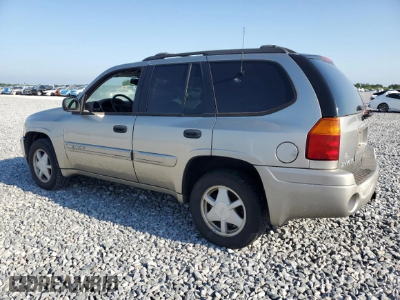 2003 GMC Envoy SLT z VIN 1GKDS13S032373020, wystawiony jako Copart lot #54986765 z przebiegiem 235 711 mil mil oraz Tytuł czysty. Historia ofert i sprzedaży dostępna na DreamBid. Obrazek 2.