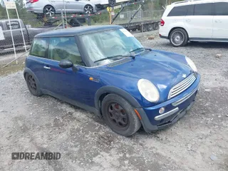 2004 MINI Hardtop with VIN WMWRC33494TJ55646, listed as a IAAI auction lot 41944170 with 114,943 mi miles and . Bid and sale history available at DreamBid. Image 1.