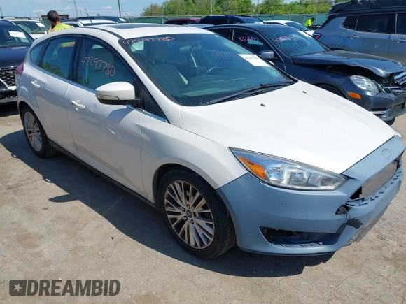 2018 Ford Focus Titanium with VIN 1FADP3N24JL279449, listed as a IAAI auction lot 42297780 with 144,479 mi miles and . Bid and sale history available at DreamBid. Image 1.