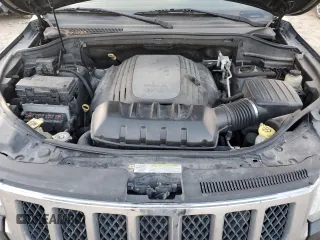 2011 Jeep Grand Cherokee Overland with VIN 1J4RR6GT8BC517168, listed as a Copart auction lot 88652055 with 175,431 mi miles and Salvage title. Bid and sale history available at DreamBid. Image 12.