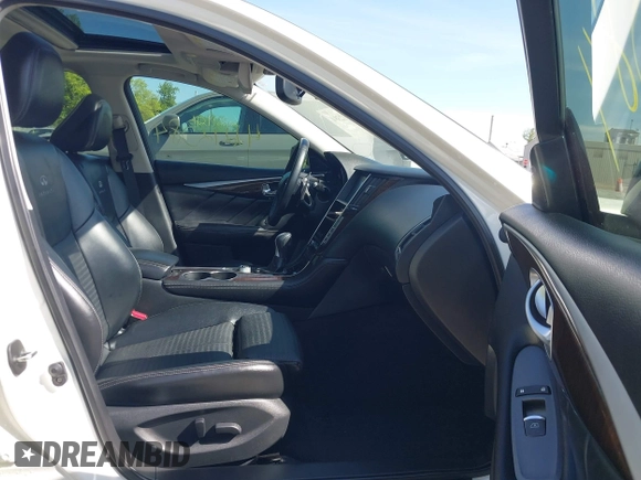 2014 Infiniti Q50 Hybrid Sport with VIN JN1AV7AR0EM703550, listed as a IAAI auction lot 42212384 with 79,308 mi miles and . Bid and sale history available at carsss.com. Image 5.