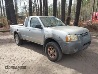 2001 Nissan Frontier SE Desert Runner z VIN 1N6ED26TX1C330023, wystawiony jako IAAI lot #41932645 z przebiegiem 133 709 mil mil oraz . Historia ofert i sprzedaży dostępna na DreamBid. Obrazek 1.