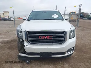 2019 GMC Yukon SLT with VIN 1GKS1BKCXKR329607, listed as a IAAI auction lot 41188239 with 84,940 mi miles. Bid and sale history available at carsss.com. Image 12.