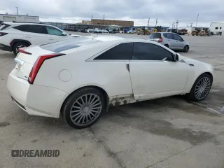 2014 Cadillac CTS Performance with VIN 1G6DG1E35E0190085, listed as a Copart auction lot 84347104 with 142,720 mi miles and Salvage title. Bid and sale history available at DreamBid. Image 3.