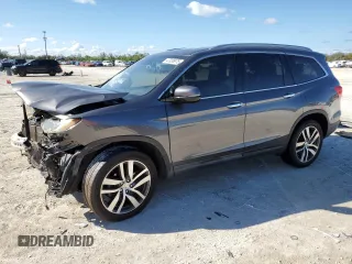 2017 Honda Pilot Touring with VIN 5FNYF5H94HB011565, listed as a Copart auction lot 47035975 with 0 mi miles and Salvage Title. Bid and sale history available at carsss.com. Image 1.