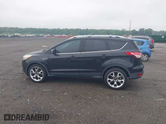2015 Ford Escape Titanium z VIN 1FMCU0JX7FUB00462, wystawiony jako IAAI lot #42532943 z przebiegiem 88 623 mil mil oraz . Historia ofert i sprzedaży dostępna na DreamBid. Obrazek 14.