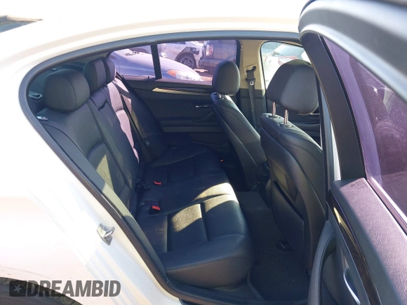 2015 BMW 5 Series 528i with VIN WBA5A5C56FD512769, listed as a IAAI auction lot 40832378 with 113,669 mi miles. Bid and sale history available at carsss.com. Image 8.
