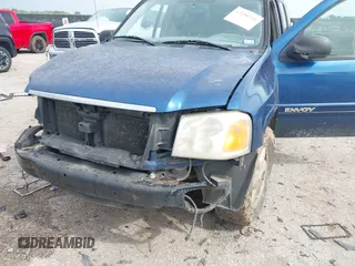 2005 GMC Envoy SLE z VIN 1GKES16S756149142, wystawiony jako IAAI lot #42188531 z przebiegiem 240 691 mil mil oraz . Historia ofert i sprzedaży dostępna na DreamBid. Obrazek 6.