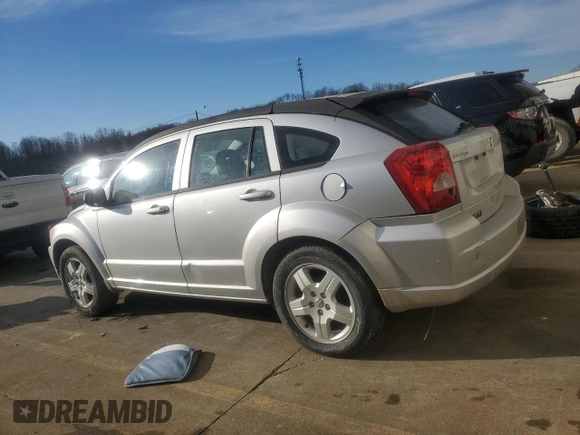 2009 Dodge Caliber SXT z VIN 1B3HB48A59D104136, wystawiony jako Copart lot #45971285 z przebiegiem 291 374 mil mil oraz Szkoda całkowita • Salvage title. Historia ofert i sprzedaży dostępna na DreamBid. Obrazek 2.