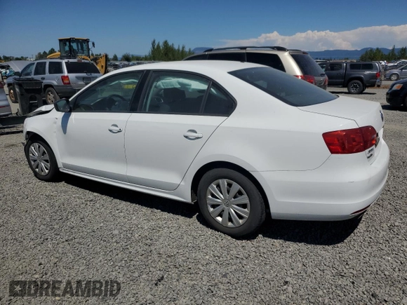 2014 Volkswagen Jetta S with VIN 3VW2K7AJ2EM303673, listed as a Copart auction lot 62909235 with 69,592 mi miles and Salvage title. Bid and sale history available at DreamBid. Image 2.
