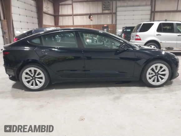 2023 Tesla Model 3 with VIN 5YJ3E1EA5PF552241, listed as a IAAI auction lot 41876487 with 18,533 mi miles and . Bid and sale history available at carsss.com. Image 13.
