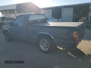 1994 Mitsubishi Mighty Max z VIN JA7LS21G6RP012556, wystawiony jako Copart lot #44242825 z przebiegiem 213 338 mil mil oraz Szkody całkowita. Historia ofert i sprzedaży dostępna na DreamBid. Obrazek 2.
