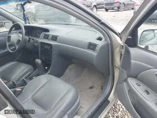 2000 Toyota Camry CE with VIN JT2BG22K2Y0447819, listed as a IAAI auction lot 42082746 with 98,578 mi miles. Bid and sale history available at carsss.com. Image 5.