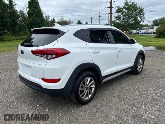 2018 Hyundai Tucson SEL z VIN KM8J33A40JU676727, wystawiony jako Copart lot #87532055 z przebiegiem 128 554 mil mil oraz Czysty tytuł • Clean title. Historia ofert i sprzedaży dostępna na DreamBid. Obrazek 4.