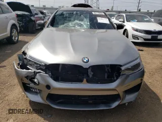 2018 BMW M5 z VIN WBSJF0C50JB283220, wystawiony jako Copart lot #62178853 z przebiegiem Nie podano mil oraz . Historia ofert i sprzedaży dostępna na DreamBid. Obrazek 5.