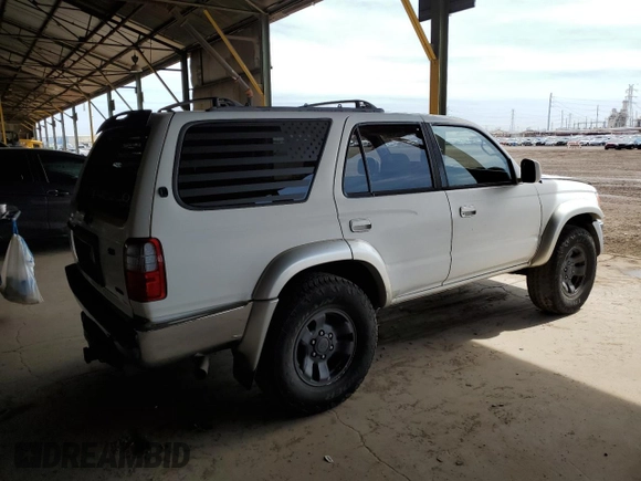 2000 Toyota 4Runner SR5 z VIN JT3GN86R9Y0169700, wystawiony jako Copart lot #56574135 z przebiegiem 197 734 mil mil oraz Szkoda całkowita • Salvage title. Historia ofert i sprzedaży dostępna na DreamBid. Obrazek 3.