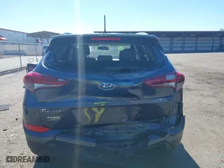 2017 Hyundai Tucson SE Plus with VIN KM8J33A45HU420349, listed as a IAAI auction lot 41296190 with 77,910 mi miles. Bid and sale history available at carsss.com. Image 16.