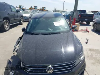 2018 Volkswagen Passat 2.0T S with VIN 1VWAA7A31JC015784, listed as a IAAI auction lot 41829586 with 72,437 mi miles. Bid and sale history available at carsss.com. Image 13.