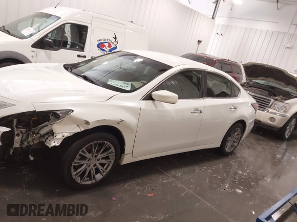 2015 Nissan Altima S with VIN 1N4AL3AP1FC169711, listed as a IAAI auction lot 41884037 with 129,228 mi miles and . Bid and sale history available at DreamBid. Image 15.