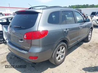 2009 Hyundai Santa Fe SE z VIN 5NMSH13E89H325006, wystawiony jako IAAI lot #42298182 z przebiegiem 164 253 mil mil oraz . Historia ofert i sprzedaży dostępna na DreamBid. Obrazek 4.
