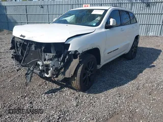 2018 Jeep Grand Cherokee Altitude with VIN 1C4RJFAG4JC309523, listed as a IAAI auction lot 42159534 with 86,682 mi miles and . Bid and sale history available at DreamBid. Image 2.
