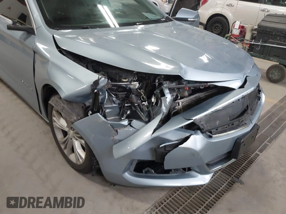 2014 Chevrolet Impala LT z VIN 1G1115SL5EU144917, wystawiony jako IAAI lot #42031865 z przebiegiem 156 347 mil mil oraz . Historia ofert i sprzedaży dostępna na DreamBid. Obrazek 6.