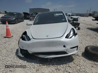 2023 Tesla Model Y Long Range z VIN 7SAYGDEE4PA064502, wystawiony jako Copart lot #53337645 z przebiegiem 16 945 mil mil oraz Szkoda całkowita • Salvage title. Historia ofert i sprzedaży dostępna na DreamBid. Obrazek 5.