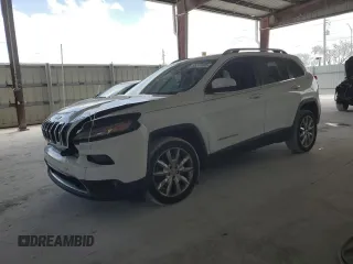 2014 Jeep Cherokee Limited with VIN 1C4PJLDB6EW301594, listed as a Copart auction lot 55247605 with 131,893 mi miles and Salvage title. Bid and sale history available at DreamBid. Image 1.