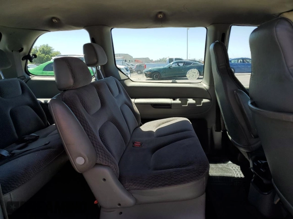 1999 Dodge Caravan with VIN 2B4FP25B0XR192013, listed as a Copart auction lot 55006624 with 195,008 mi miles and Salvage title. Bid and sale history available at DreamBid. Image 11.