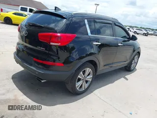 2014 Kia Sportage SX with VIN KNDPC3A66E7585269, listed as a IAAI auction lot 42423325 with 173,517 mi miles and . Bid and sale history available at DreamBid. Image 4.