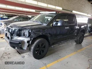 2011 Nissan Titan Pro-4X z VIN 1N6AA0EC5BN307980, wystawiony jako Copart lot #42000295 z przebiegiem 168 335 mil mil oraz Szkody całkowita. Historia ofert i sprzedaży dostępna na DreamBid. Obrazek 1.