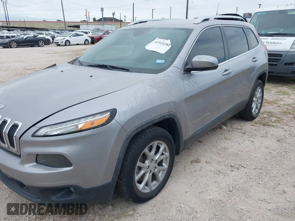 2018 Jeep Cherokee Latitude with VIN 1C4PJLCX4JD559096, listed as a IAAI auction lot 41925282 with 127,488 mi miles and . Bid and sale history available at DreamBid. Image 6.