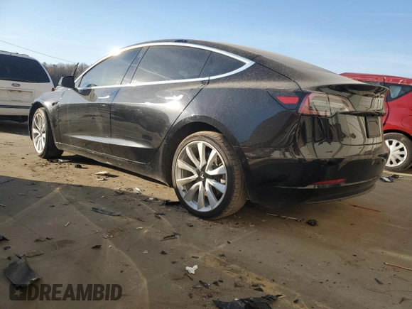 2019 Tesla Model 3 Mid Range with VIN 5YJ3E1EA9KF412525, listed as a Copart auction lot 48689825 with 134,768 mi miles and Salvage Title. Bid and sale history available at DreamBid. Image 2.