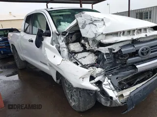 2014 Toyota Tundra 4WD Truck SR with VIN 5TFUY5F12EX343866, listed as a IAAI auction lot 41724838 with 261,330 mi miles. Bid and sale history available at carsss.com. Image 1.