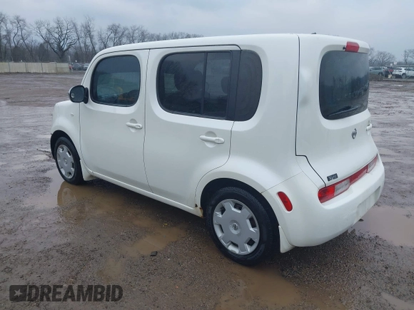 2012 Nissan Cube S z VIN JN8AZ2KR4CT255582, wystawiony jako IAAI lot #41679316 z przebiegiem 244 794 mil mil oraz . Historia ofert i sprzedaży dostępna na DreamBid. Obrazek 3.