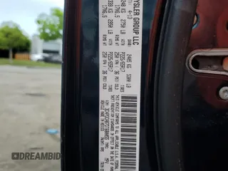 2013 Dodge Journey SE with VIN 3C4PDCAB7DT680055, listed as a Copart auction lot 58241435 with 199,620 mi miles and Salvage title. Bid and sale history available at DreamBid. Image 13.