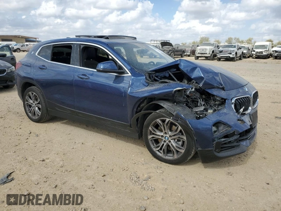 2022 BMW X2 xDrive28i with VIN WBXYJ1C01N5U27511, listed as a Copart auction lot 78460654 with 71,760 mi miles and Salvage Title. Bid and sale history available at carsss.com. Image 4.