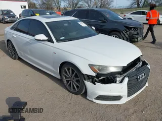 2017 Audi A6 Premium z VIN WAUF8AFC1HN100842, wystawiony jako IAAI lot #42024333 z przebiegiem 89 275 mil mil oraz . Historia ofert i sprzedaży dostępna na DreamBid. Obrazek 1.