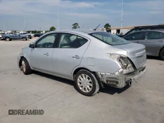 2012 Nissan Versa SV with VIN 3N1CN7AP7CL825501, listed as a Copart auction lot 63093735 with 129,227 mi miles and Salvage title. Bid and sale history available at DreamBid. Image 2.
