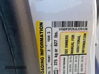 2018 Ford Focus SE z VIN 1FADP3F29JL225126, wystawiony jako Copart lot #52817265 z przebiegiem Nie podano mil oraz Szkoda całkowita • Salvage title. Historia ofert i sprzedaży dostępna na DreamBid. Obrazek 12.