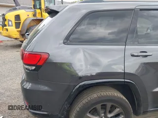2016 Jeep Grand Cherokee Limited 75th Anniversary with VIN 1C4RJFBG6GC399099, listed as a IAAI auction lot 42148866 with 139,969 mi miles and . Bid and sale history available at DreamBid. Image 12.
