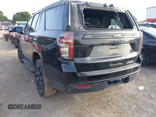 2024 Chevrolet Tahoe RST with VIN 1GNSCRKDXRR145972, listed as a IAAI auction lot 42216403 with 30,952 mi miles and . Bid and sale history available at DreamBid. Image 3.