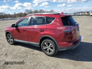 2018 Toyota RAV4 XLE with VIN 2T3RFREVXJW715931, listed as a Copart auction lot 48130715 with 106,324 mi miles and Salvage Title. Bid and sale history available at DreamBid. Image 2.