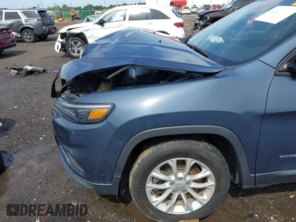 2020 Jeep Cherokee Latitude z VIN 1C4PJLCB7LD631903, wystawiony jako IAAI lot #42523873 z przebiegiem 49 651 mil mil oraz . Historia ofert i sprzedaży dostępna na DreamBid. Obrazek 19.