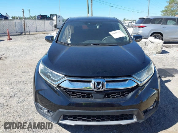 2017 Honda CR-V EX with VIN 7FARW1H52HE000353, listed as a IAAI auction lot 41824218 with 91,204 mi miles. Bid and sale history available at carsss.com. Image 12.