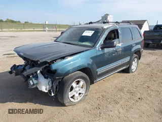 2005 Jeep Grand Cherokee Laredo z VIN 1J4GR48KX5C593240, wystawiony jako IAAI lot #40390746 z przebiegiem 177 646 mil mil oraz . Historia ofert i sprzedaży dostępna na DreamBid. Obrazek 2.